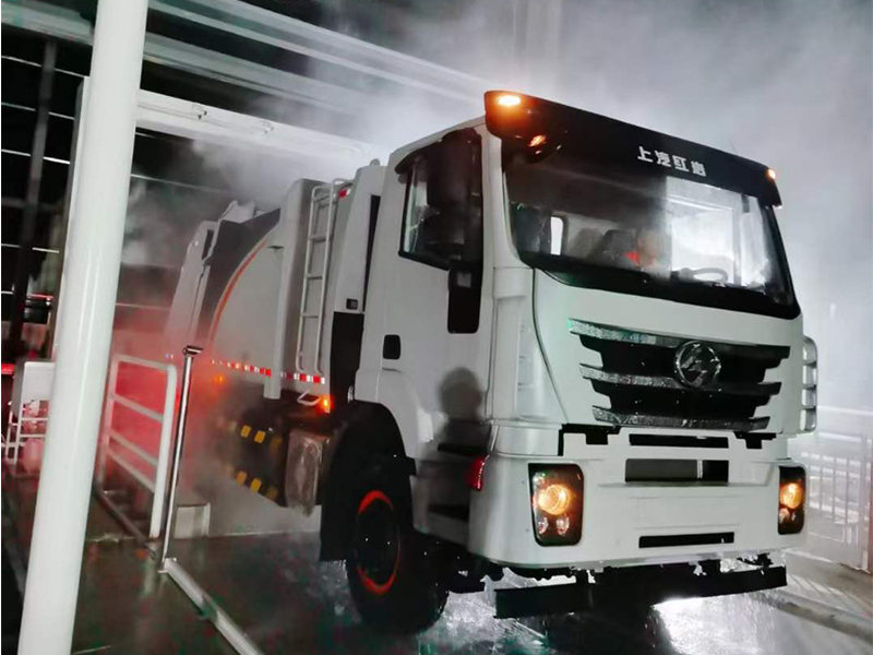 Garbage truck disinfecting and washing machine