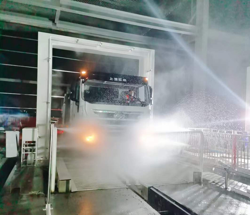 Garbage truck disinfecting and washing machine